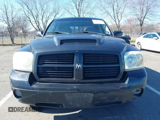 2007 Dodge Dakota SLT z VIN 1D7HW48JX7S196121, wystawiony jako IAAI lot #41863734 z przebiegiem 148 720 mil mil oraz . Historia ofert i sprzedaży dostępna na DreamBid. Obrazek 12.