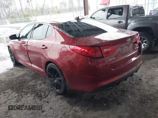 2014 Kia Optima SX Turbo with VIN 5XXGR4A60EG286453, listed as a IAAI auction lot 41661379 with 163,206 mi miles and . Bid and sale history available at DreamBid. Image 3.