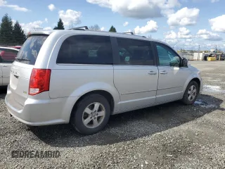 2011 Dodge Grand Caravan Crew with VIN 2D4RN5DG8BR755129, listed as a Copart auction lot 50531765 with 153,104 mi miles and Salvage Title. Bid and sale history available at DreamBid. Image 3.