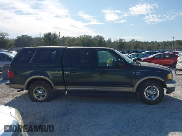 2003 Ford F-150 XLT with VIN 1FTRW07L53KA64064, listed as a IAAI auction lot 41697350 with 227,114 mi miles. Bid and sale history available at carsss.com. Image 13.