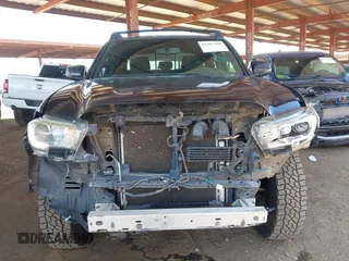 2017 Toyota Tacoma SR5 z VIN 3TMCZ5AN0HM110825, wystawiony jako IAAI lot #42297408 z przebiegiem 126 769 mil mil oraz . Historia ofert i sprzedaży dostępna na DreamBid. Obrazek 6.