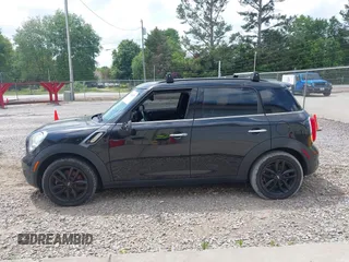 2016 MINI Countryman S z VIN WMWZC3C58GWP53495, wystawiony jako IAAI lot #42134455 z przebiegiem 92 862 mil mil oraz . Historia ofert i sprzedaży dostępna na DreamBid. Obrazek 14.