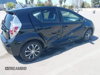 2012 Toyota Prius c One with VIN JTDKDTB36C1527223, listed as a IAAI auction lot 42002927 with 138,176 mi miles. Bid and sale history available at carsss.com. Image 4.