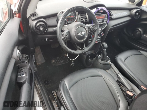 2014 MINI Hardtop with VIN WMWXM5C52ET934803, listed as a Copart auction lot 55284765 with 96,519 mi miles and Salvage title. Bid and sale history available at DreamBid. Image 8.