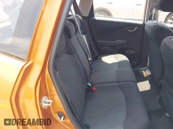 2009 Honda Fit Sport with VIN JHMGE88409S069339, listed as a IAAI auction lot 42498138 with 95,457 mi miles and . Bid and sale history available at DreamBid. Image 8.