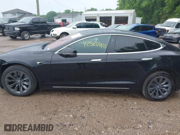 2018 Tesla Model S 75D with VIN 5YJSA1E21JF283971, listed as a IAAI auction lot 42507010 with 117,934 mi miles and . Bid and sale history available at DreamBid. Image 15.