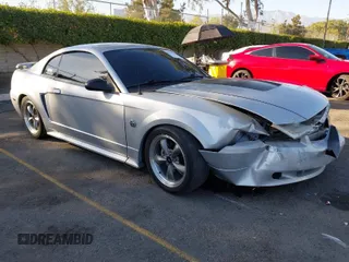 2004 Ford Mustang Standard with VIN 1FAFP40434F100991, listed as a IAAI auction lot 40706520 with 93,130 mi miles. Bid and sale history available at carsss.com. Image 1.