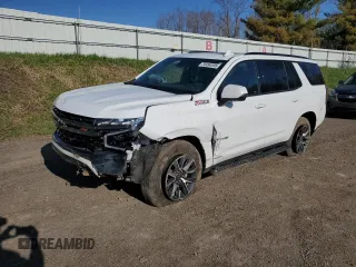 2021 Chevrolet Tahoe Z71 z VIN 1GNSKPKD0MR107957, wystawiony jako Copart lot #54494545 z przebiegiem 73 647 mil mil oraz Czysty tytuł • Clean title. Historia ofert i sprzedaży dostępna na DreamBid. Obrazek 1.