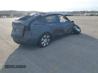 2023 Tesla Model Y Performance with VIN 7SAYGDEF1PA048850, listed as a IAAI auction lot 38709731 with Not Provided miles and . Bid and sale history available at DreamBid. Image 4.