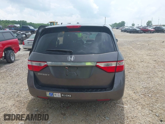 2012 Honda Odyssey EX-L with VIN 5FNRL5H60CB054277, listed as a IAAI auction lot 42459861 with 205,722 mi miles and . Bid and sale history available at DreamBid. Image 16.