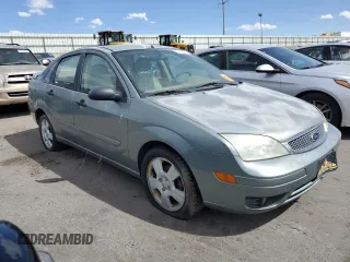 2005 Ford Focus S with VIN 1FAFP34N35W235922, listed as a Copart auction lot 54729854 with Not Provided miles and Salvage Title. Bid and sale history available at carsss.com. Image 4.
