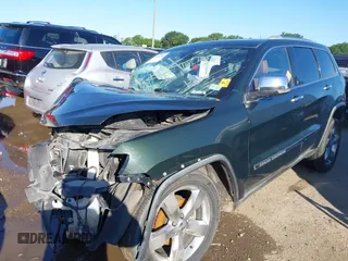 2011 Jeep Grand Cherokee Overland with VIN 1J4RS6GG0BC739372, listed as a IAAI auction lot 36440389 with 102,976 mi miles and . Bid and sale history available at DreamBid. Image 2.