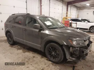 2020 Dodge Journey SE Value with VIN 3C4PDCAB7LT261279, listed as a IAAI auction lot 41564096 with 67,388 mi miles and . Bid and sale history available at DreamBid. Image 1.
