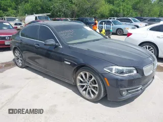 2014 BMW 5 Series 535i with VIN WBA5B1C51ED475795, listed as a IAAI auction lot 42028184 with 119,692 mi miles. Bid and sale history available at carsss.com. Image 1.