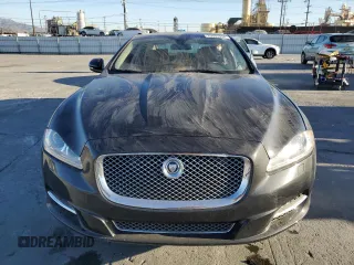 2013 Jaguar XJ with VIN SAJWA2GB0DLV43865, listed as a Copart auction lot 79693934 with 0 mi miles and Salvage Title. Bid and sale history available at carsss.com. Image 5.