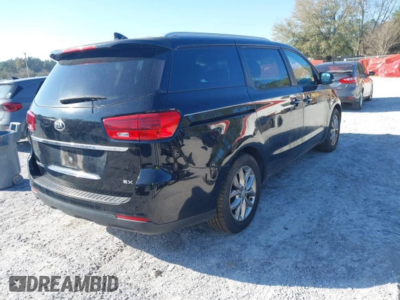 2019 Kia Sedona LX with VIN KNDMB5C1XK6537049, listed as a IAAI auction lot 41777727 with 86,987 mi miles. Bid and sale history available at carsss.com. Image 4.