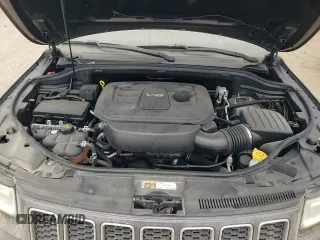 2016 Jeep Grand Cherokee High Altitude with VIN 1C4RJECG4GC314575, listed as a Copart auction lot 84265744 with 129,144 mi miles and Salvage title. Bid and sale history available at DreamBid. Image 13.