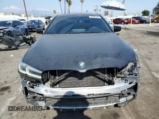 2023 BMW 5 Series 530i with VIN WBA53BH05PCM01563, listed as a Copart auction lot 55525515 with 23,371 mi miles and Salvage title. Bid and sale history available at DreamBid. Image 5.