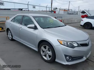 2014 Toyota Camry L with VIN 4T1BF1FK9EU438873, listed as a IAAI auction lot 42083666 with 118,597 mi miles. Bid and sale history available at carsss.com. Image 1.