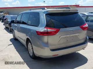2015 Toyota Sienna XLE with VIN 5TDYK3DC0FS555636, listed as a IAAI auction lot 42099577 with 114,975 mi miles. Bid and sale history available at carsss.com. Image 3.