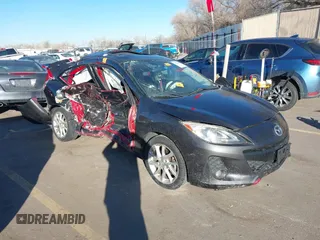 2012 Mazda 3 S Grand Touring with VIN JM1BL1W57C1530523, listed as a IAAI auction lot 41451106 with 128,567 mi miles and . Bid and sale history available at DreamBid. Image 1.