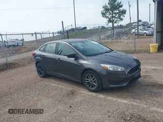 2018 Ford Focus SE with VIN 1FADP3F29JL288761, listed as a IAAI auction lot 42290510 with 93,463 mi miles and . Bid and sale history available at DreamBid. Image 1.