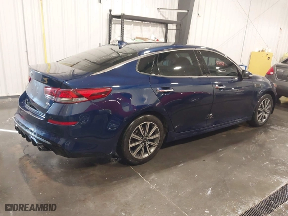 2019 Kia Optima EX with VIN 5XXGU4L19KG285328, listed as a IAAI auction lot 41653327 with 114,251 mi miles. Bid and sale history available at carsss.com. Image 4.