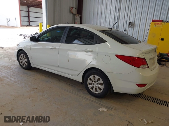 2016 Hyundai Accent SE z VIN KMHCT4AE4GU989554, wystawiony jako IAAI lot #42392926 z przebiegiem 114 759 mil mil oraz . Historia ofert i sprzedaży dostępna na DreamBid. Obrazek 3.