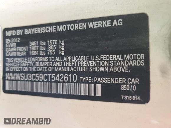 2012 MINI Hardtop with VIN WMWSU3C59CT542610, listed as a Copart auction lot 56720805 with 106,187 mi miles and Salvage Title. Bid and sale history available at DreamBid. Image 12.