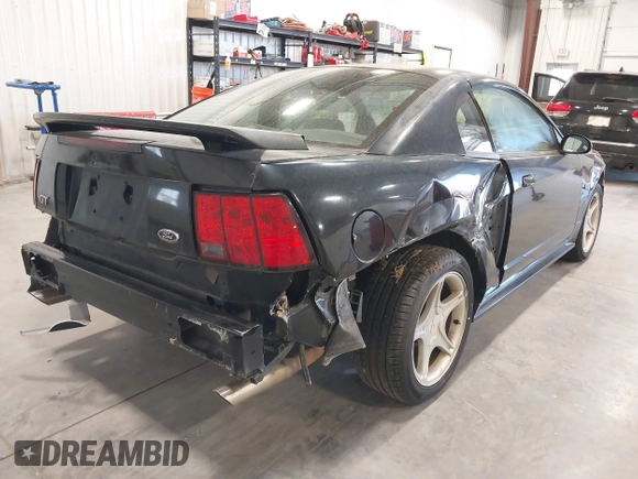 2002 Ford Mustang GT Deluxe with VIN 1FAFP42X32F241774, listed as a IAAI auction lot 41822360 with 130,101 mi miles. Bid and sale history available at carsss.com. Image 4.