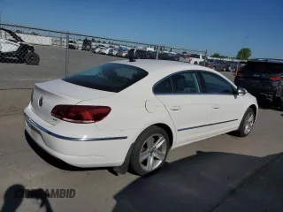 2014 Volkswagen CC R-Line с VIN WVWBP7AN8EE502398, выставлен на аукционе Copart как лот 52826405 с пробегом 121 799 миль миль и Списание • Salvage title. История ставок и продаж доступна на DreamBid. Изображение 3.