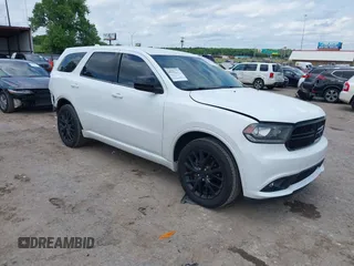 2015 Dodge Durango SXT with VIN 1C4RDHAG1FC201323, listed as a IAAI auction lot 42376596 with 139,805 mi miles and . Bid and sale history available at DreamBid. Image 1.