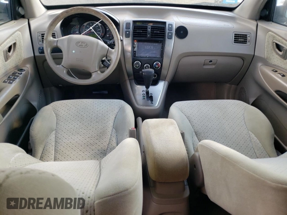 2005 Hyundai Tucson GLS with VIN KM8JN12DX5U212587, listed as a Copart auction lot 72044114 with 128,993 mi miles and Salvage Title. Bid and sale history available at carsss.com. Image 8.