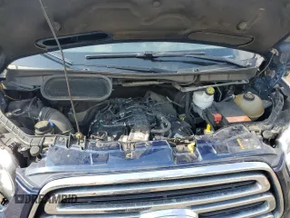 2018 Ford Transit Passenger XL z VIN 1FBZX2YG2JKB39878, wystawiony jako Copart lot #54557905 z przebiegiem 132 974 mil mil oraz Szkody całkowita. Historia ofert i sprzedaży dostępna na DreamBid. Obrazek 12.