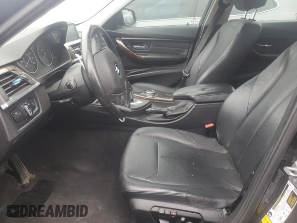 2014 BMW 3 Series 328i xDrive with VIN WBA3B5G58ENS11072, listed as a Copart auction lot 56572315 with 145,000 mi miles and Salvage title. Bid and sale history available at DreamBid. Image 7.