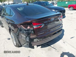 2019 Ford Fusion Hybrid Titanium with VIN 3FA6P0RU2KR123786, listed as a IAAI auction lot 41857026 with 49,604 mi miles. Bid and sale history available at carsss.com. Image 22.