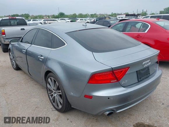 2013 Audi A7 Premium Plus with VIN WAUYGAFC1DN069906, listed as a IAAI auction lot 41906962 with 203,149 mi miles and . Bid and sale history available at DreamBid. Image 3.