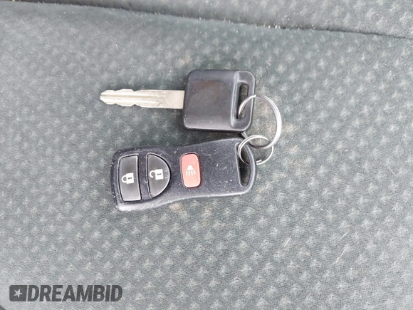 2012 Nissan Versa S z VIN 3N1BC1CP3CK267230, wystawiony jako IAAI lot #42369856 z przebiegiem 200 971 mil mil oraz . Historia ofert i sprzedaży dostępna na DreamBid. Obrazek 11.