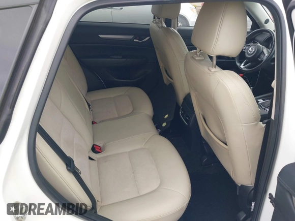 2018 Mazda CX-5 Touring with VIN JM3KFACM1J1431462, listed as a IAAI auction lot 41038099 with 77,489 mi miles. Bid and sale history available at carsss.com. Image 8.
