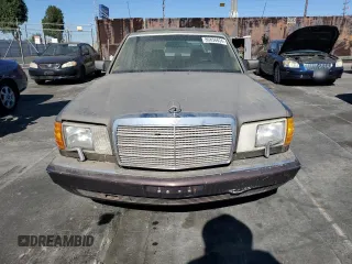 1989 Mercedes-Benz 560 with VIN WDBCA39D7KA428953, listed as a Copart auction lot 80856634 with 243,871 mi miles and Clean Title. Bid and sale history available at DreamBid. Image 5.