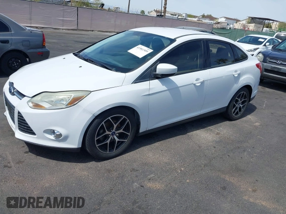 2012 Ford Focus SE with VIN 1FAHP3F24CL462319, listed as a IAAI auction lot 41981509 with 124,831 mi miles. Bid and sale history available at carsss.com. Image 6.