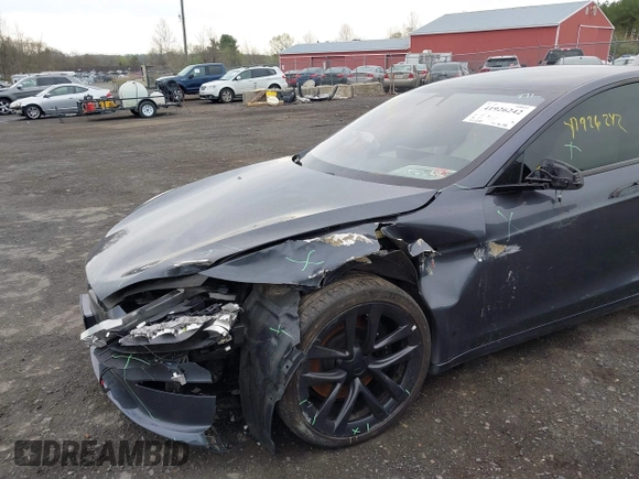 2021 Tesla Model S Long Range with VIN 5YJSA1E5XMF428519, listed as a IAAI auction lot 41926242 with 54,284 mi miles and . Bid and sale history available at DreamBid. Image 6.