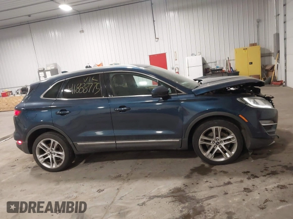 2015 Lincoln MKC with VIN 5LMTJ2AH0FUJ28744, listed as a IAAI auction lot 41888775 with 145,872 mi miles. Bid and sale history available at carsss.com. Image 13.