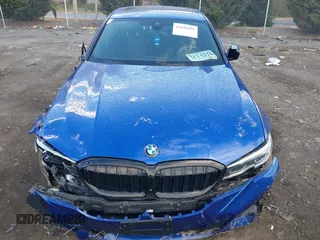 2020 BMW 3 Series M340i xDrive with VIN WBA5U9C00LFH03223, listed as a IAAI auction lot 41020498 with 58,775 mi miles and . Bid and sale history available at DreamBid. Image 12.