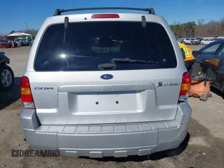 2005 Ford Escape Hybrid with VIN 1FMCU95H45KD16867, listed as a IAAI auction lot 41661311 with 206,698 mi miles. Bid and sale history available at carsss.com. Image 16.