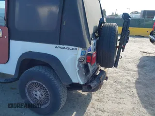 1995 Jeep Wrangler S with VIN 1J4FY19P6SP210468, listed as a IAAI auction lot 41882009 with 133,705 mi miles. Bid and sale history available at carsss.com. Image 6.