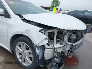 2014 Toyota Avalon Limited z VIN 4T1BK1EB6EU098479, wystawiony jako IAAI lot #42171736 z przebiegiem 92 290 mil mil oraz . Historia ofert i sprzedaży dostępna na DreamBid. Obrazek 19.
