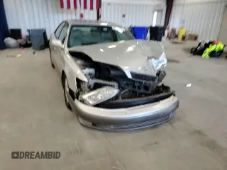 1999 Lexus ES 300 с VIN JT8BF28GXX0235471, выставлен на аукционе Copart как лот 57982605 с пробегом 187 958 миль миль и Списание • Salvage title. История ставок и продаж доступна на DreamBid. Изображение 13.