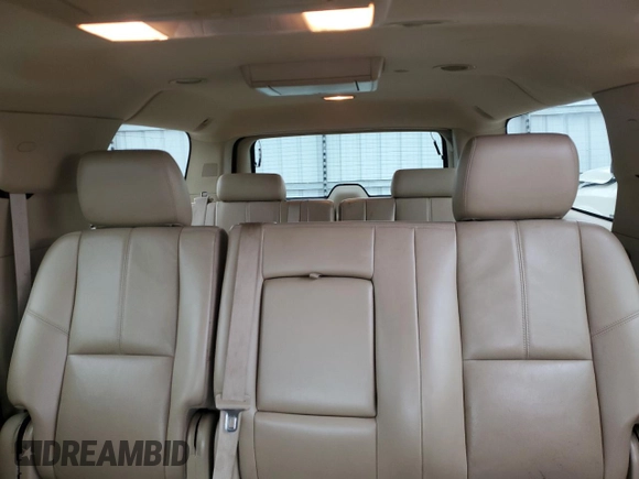 2011 Chevrolet Suburban LT with VIN 1GNSKJE36BR333157, listed as a Copart auction lot 50196875 with 147,448 mi miles and Salvage Title. Bid and sale history available at carsss.com. Image 10.