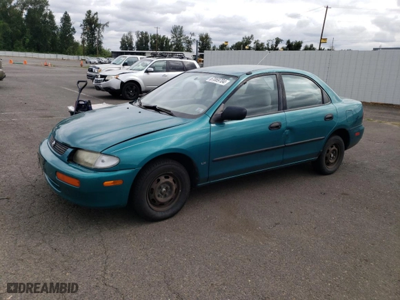 1996 Mazda Protege DX with VIN JM1BB1411T0325045, listed as a Copart auction lot 67069704 with NaN miles and Salvage Title. Bid and sale history available at carsss.com. Image 1.